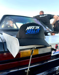 Make ’Em Sell It – Black Snapback Hat | White & Blue Embroidery